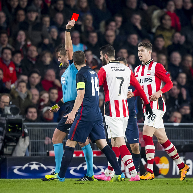 Pereiro gets booked - Image Source: The Guardian