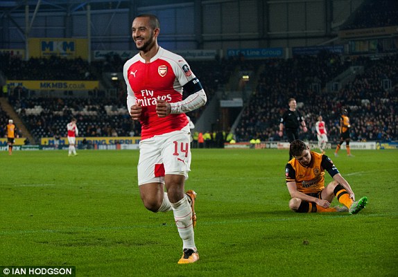 Theo Walcott also bags two goals 