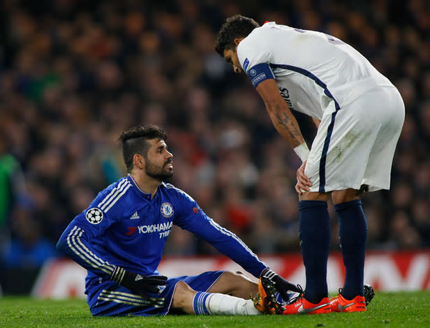 costa goes down against psg