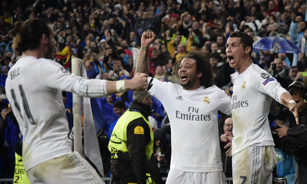 real madrid celebrate beating wolfsburg