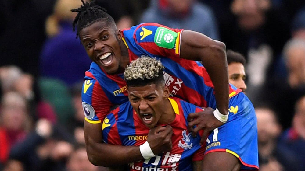 Wilfried Zaha and Patrick van Aanholt are full of emotion