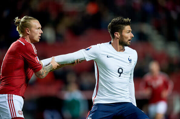 Denmark vs France - International Friendly COPENHAGEN, DENMARK - OCTOBER 11: Simon Kjar of Denmark holds on to Olivier Giroud of France during the International Friendly match between Denmark and France at Telia Parken Stadium on October 11, 2015 in Copenhagen, Denmark. (Photo by Lars Ronbog / FrontZoneSport via Getty Images)