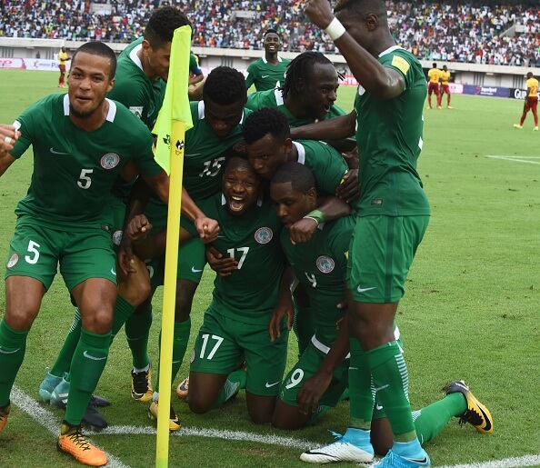 Nigeria's players celebrate after scoring a goal during the 2018 FIFA World Cup qualifying football match between Nigeria and Cameroon at Godswill Akpabio International Stadium in Uyo, southern Nigeria, on September 1, 2017. / AFP PHOTO / PIUS UTOMI EKPEI (Photo credit should read PIUS UTOMI EKPEI/AFP/Getty Images)