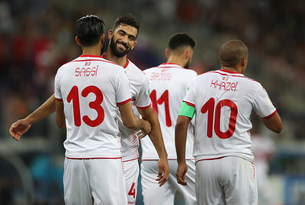 VOLGOGRAD, RUSSIA - JUNE 18: Ferjani Sassi of Tunisia is congratulated by Yassine Meriah of Tunisiaa after he scores a penalty during the 2018 FIFA World Cup Russia group G match between Tunisia and England at Volgograd Arena on June 18, 2018 in Volgograd, Russia. (Photo by Ian MacNicol/Getty Images)